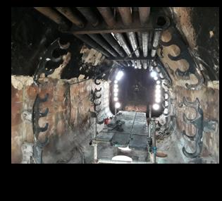 Internal furnace inspection and intervention with refractory-condition evidence.
