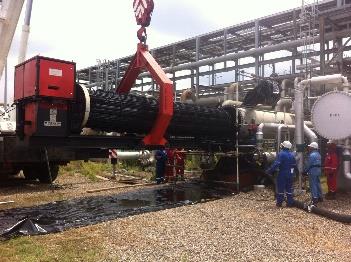 Tube-bundle handling with specialized equipment, rigging and field coordination.